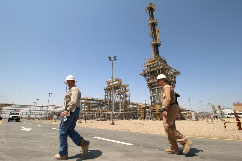A member of security foreign personnel walks with an Exxon’s
