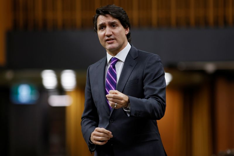 Canada’s Prime Minister Justin Trudeau speaks in response to the