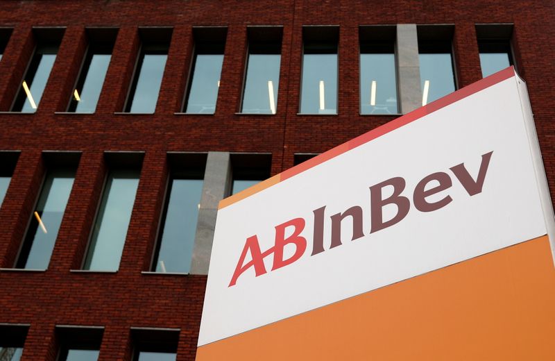FILE PHOTO: The logo of AB InBev is pictured outside
