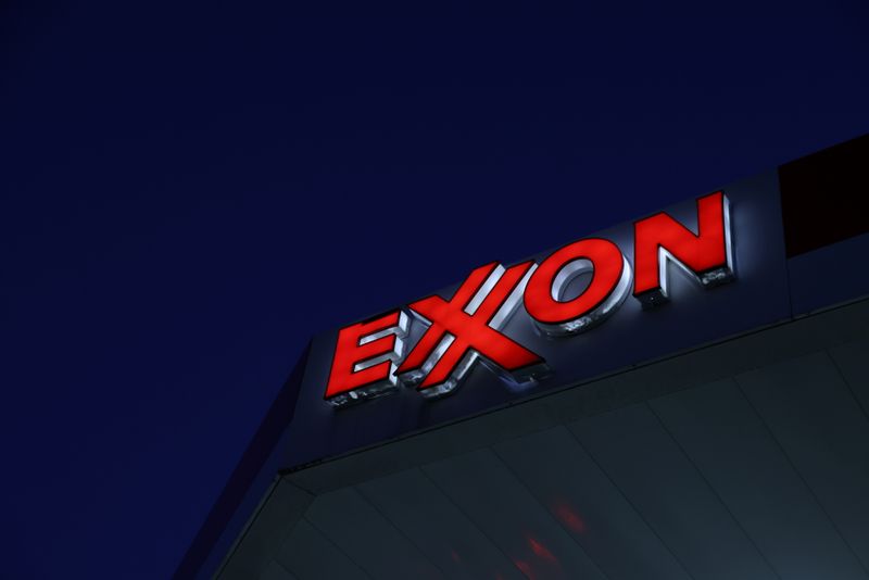 Signage is seen at an Exxon gas station in Brooklyn,