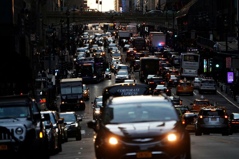 FILE PHOTO: Traffic is pictured at twilight along 42nd St.