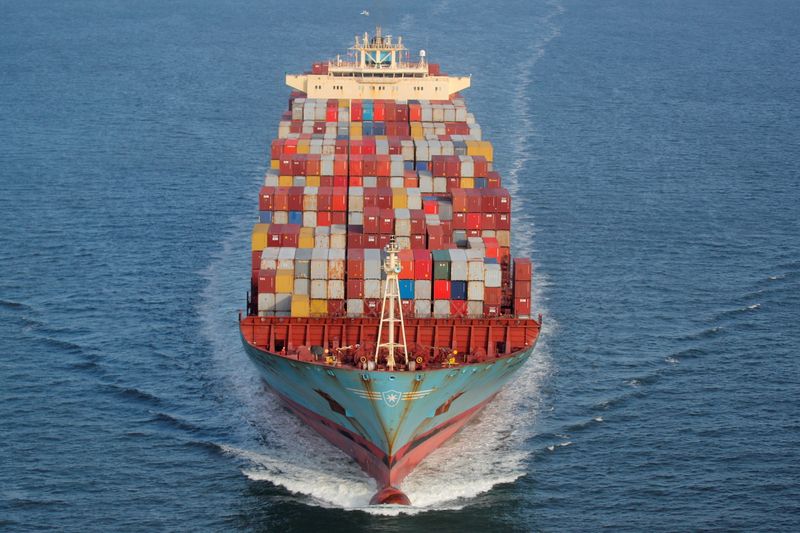 FILE PHOTO: Containers are stacked on the deck of the