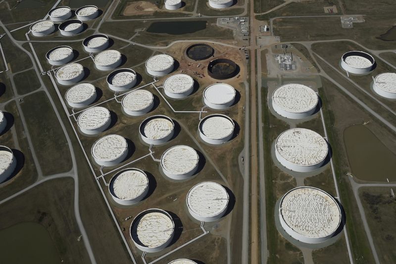 FILE PHOTO: Crude oil storage tanks are seen from above