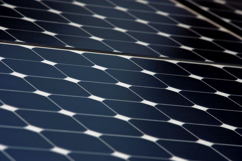 FILE PHOTO: Solar panels sit on the roof of SunPower
