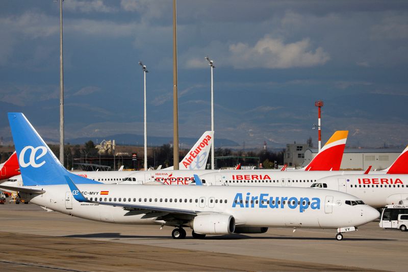 FILE PHOTO: Iberia and Air Europa planes parked at Adolfo
