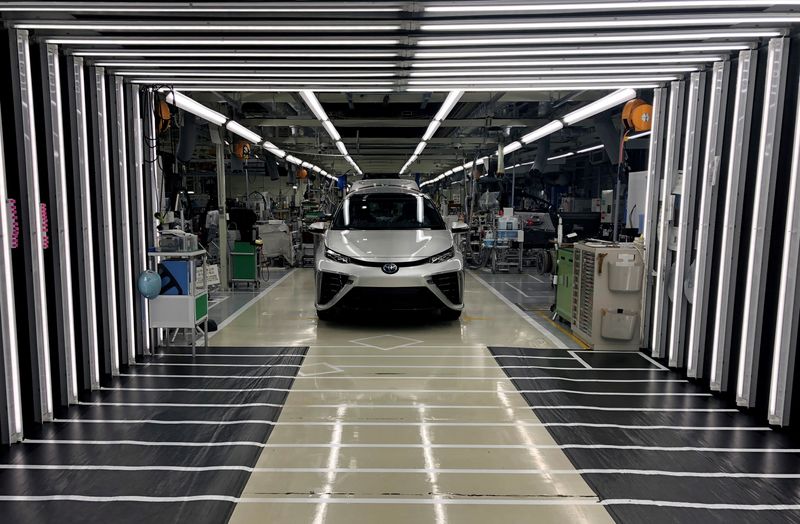 A Toyota Mirai fuel cell vehicle awaits final inspection at