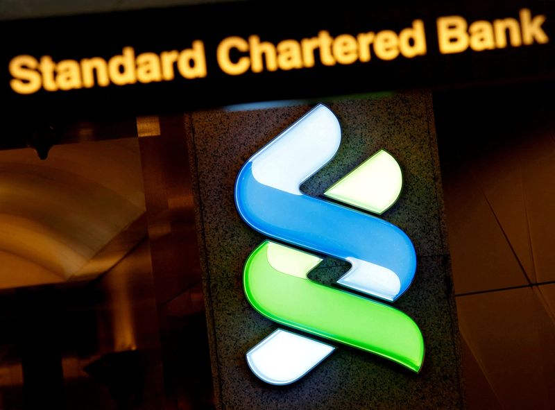 A logo of Standard Chartered is displayed at its main