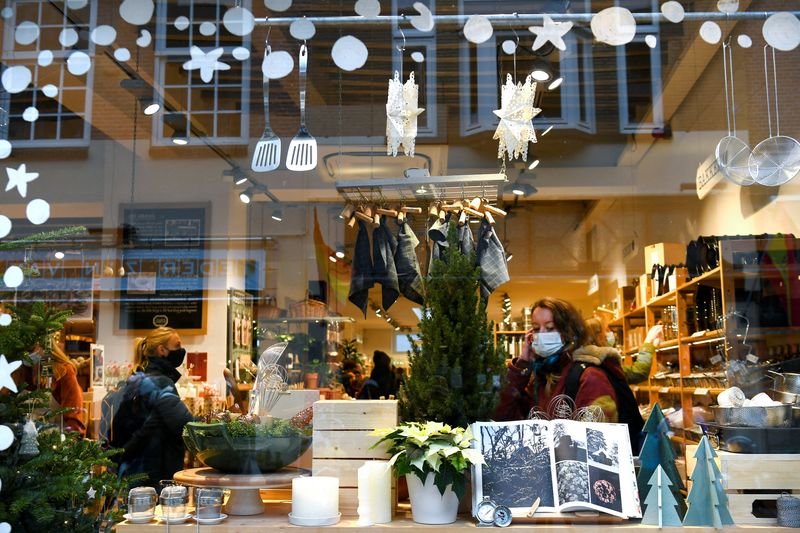 FILE PHOTO: People do their Christmas shopping before the Netherlands