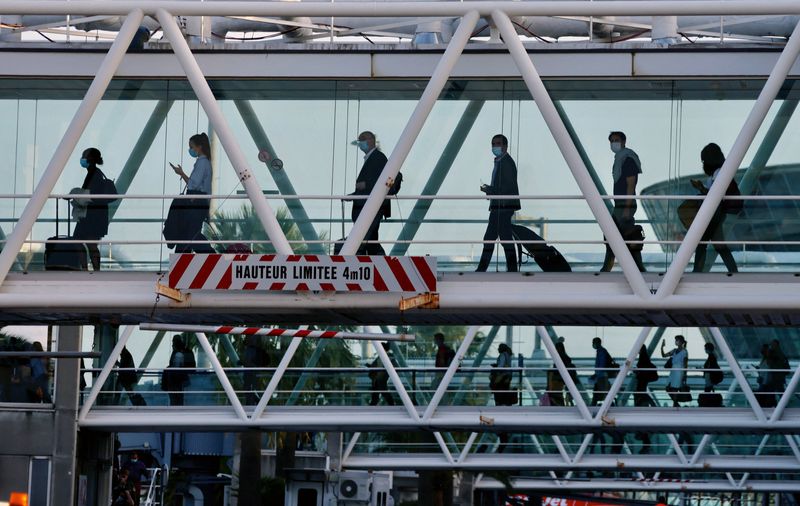 Passengers board a flight at Nice Cote d’Azur airport