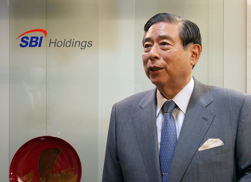 SBI Holdings CEO Yoshitaka Kitao speaks during an interview with