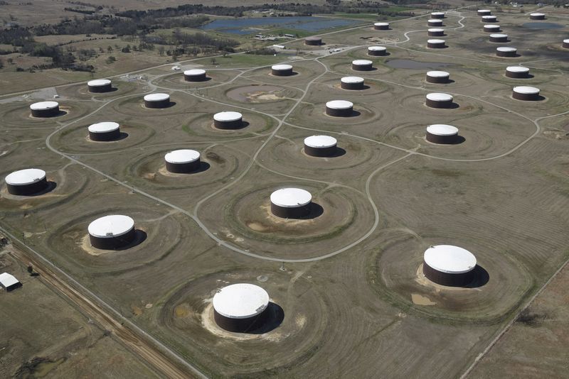 FILE PHOTO: Crude oil storage tanks are seen from above