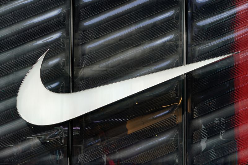 The Nike swoosh logo is seen outside the store on