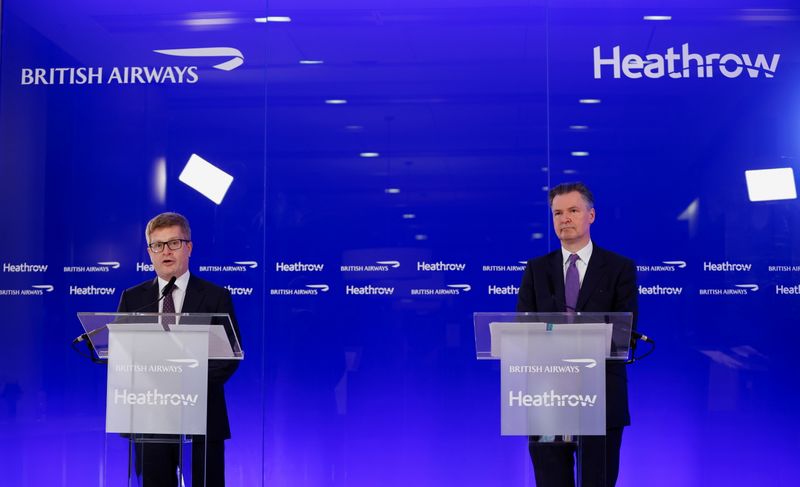 Heathrow Airport CEO Holland-Kaye and British Airways CEO Doyle hold