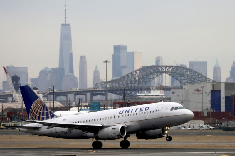FILE PHOTO: FILE PHOTO: A United Airlines passenger jet takes