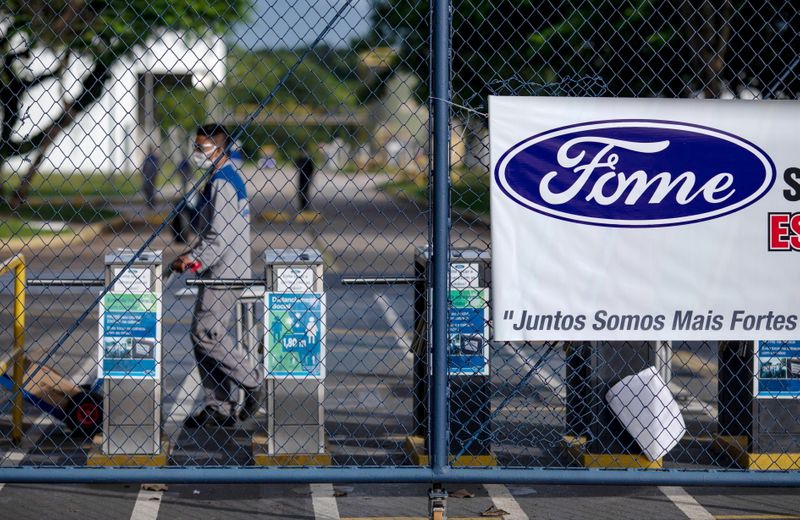 FILE PHOTO: Workers protest at Ford Motor Co’s plant in