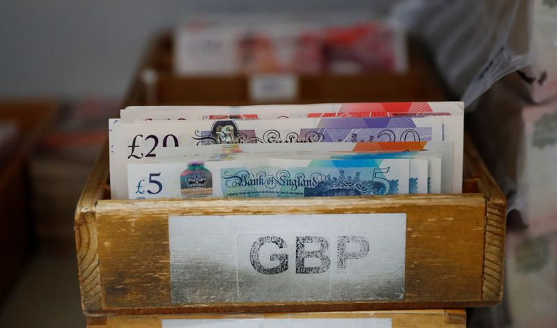 British Pound Sterling banknotes are pictured at the Money Service