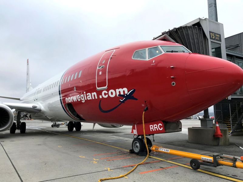 A Norwegian Air plane is refuelled at Oslo Gardermoen airport