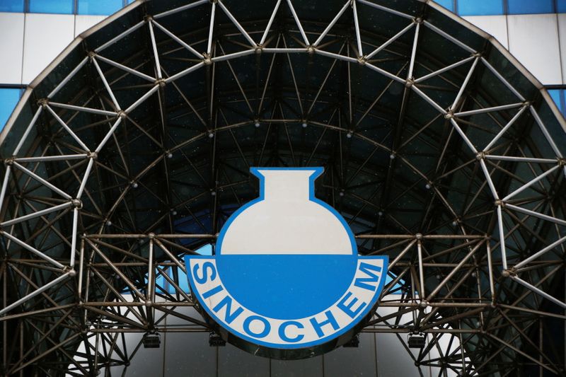 A logo of Sinochem is seen outside an office building