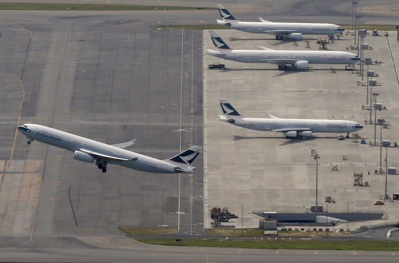 FILE PHOTO: A Cathay Pacific Airways passenger flight takes off