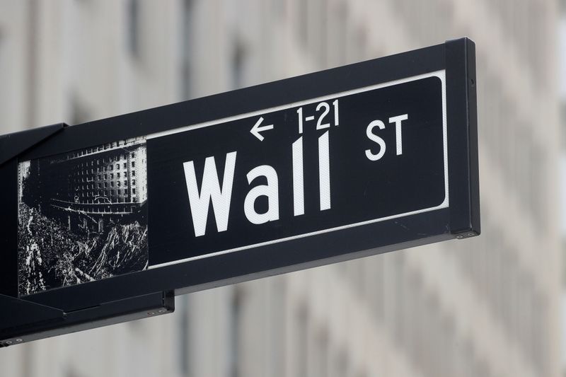 The Wall St. sign is seen near the NYSE in