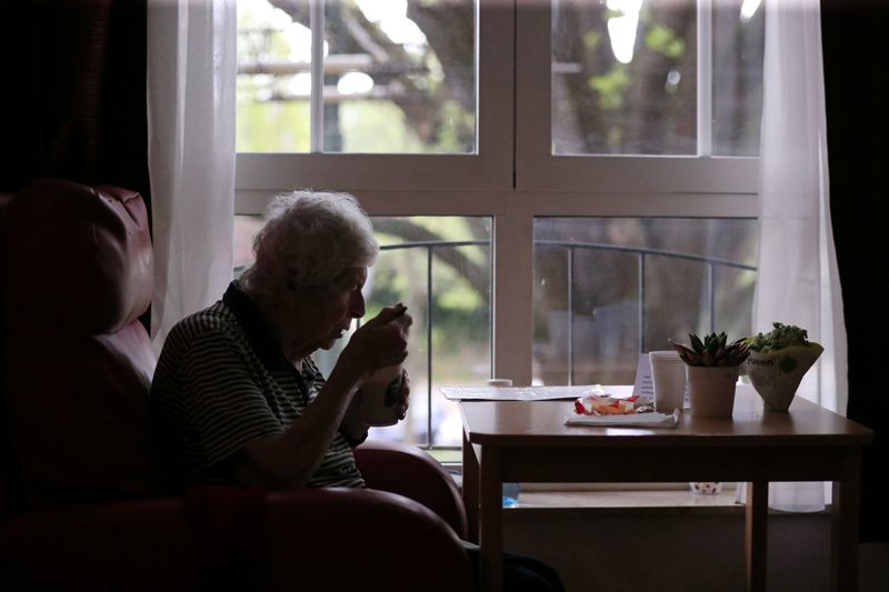 FILE PHOTO: The cost of caregiving: When financial and emotional