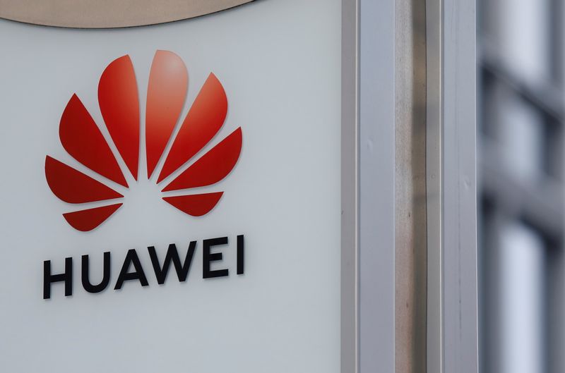 FILE PHOTO: Logo of Huawei is seen in front of