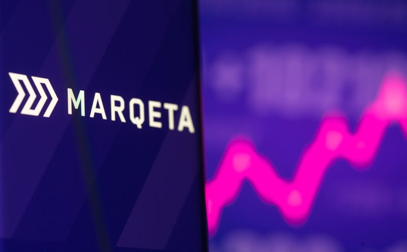 Illustration picture of Marqeta logo in front of displayed stock
