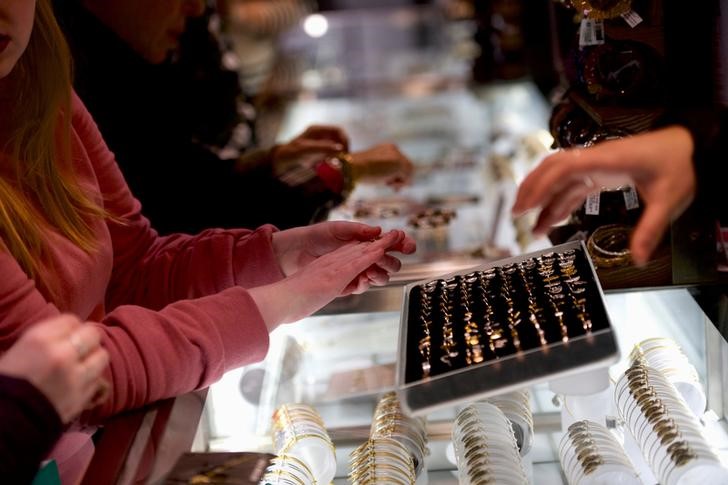 FILE PHOTO: Women shop for jewelry in ALEX AND ANI