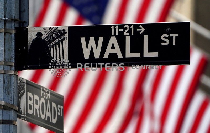 FILE PHOTO: A Wall Street sign is pictured outside the