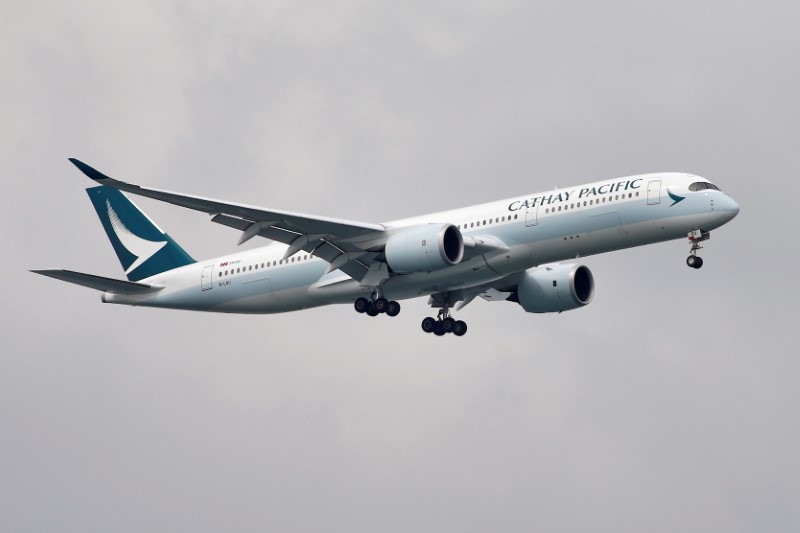 FILE PHOTO: A Cathay Pacific Airways Airbus A350 airplane approaches