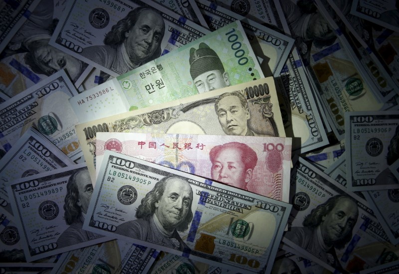 File photo illustration of South Korean won, Chinese yuan and