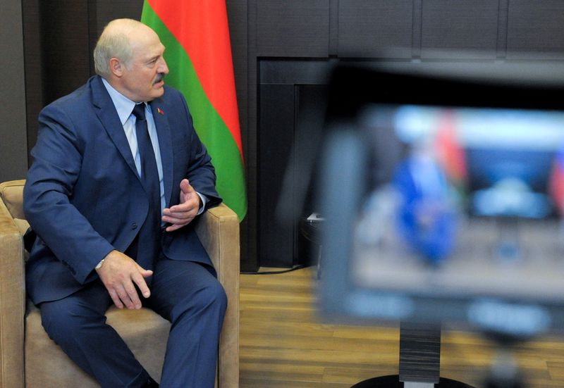FILE PHOTO: Russian President Putin meets with his Belarusian counterpart Lukashenko