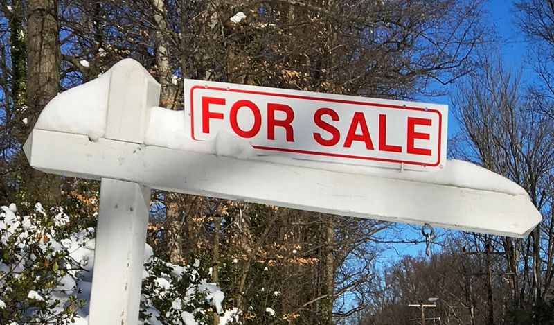 FILE PHOTO: A house-for-sale sign inside the Washington DC Beltway