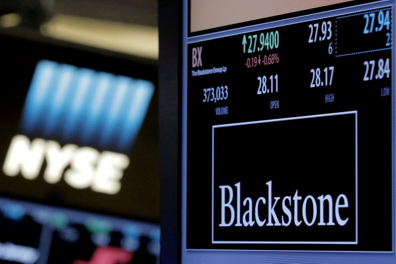 FILE PHOTO: The ticker and trading information for Blackstone Group