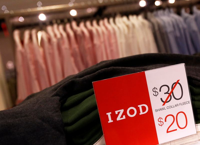 Price markdowns are seen in the Izod section at the