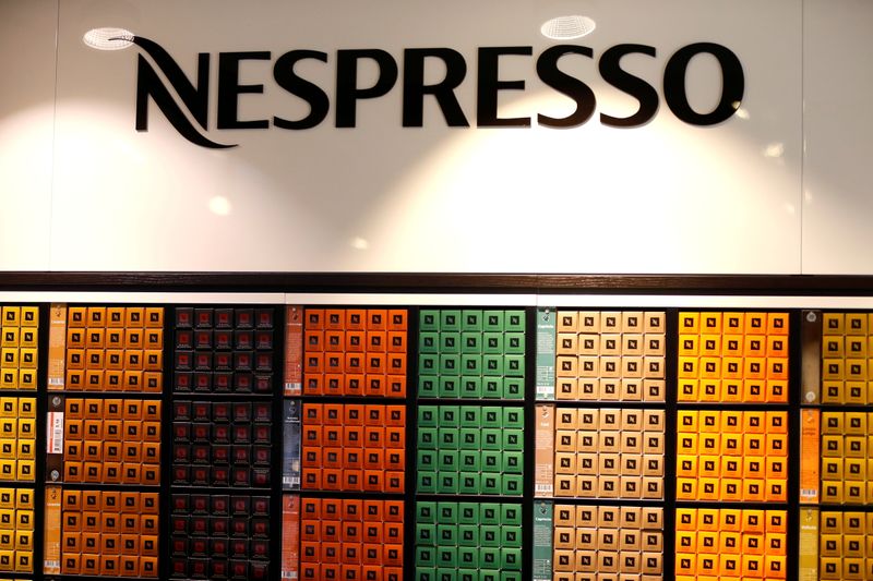 FILE PHOTO: The Nespresso logo and boxes of Nespresso coffee