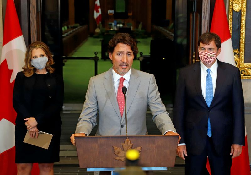 FILE PHOTO: Canadian Prime Minister Trudeau speaks to reporters next