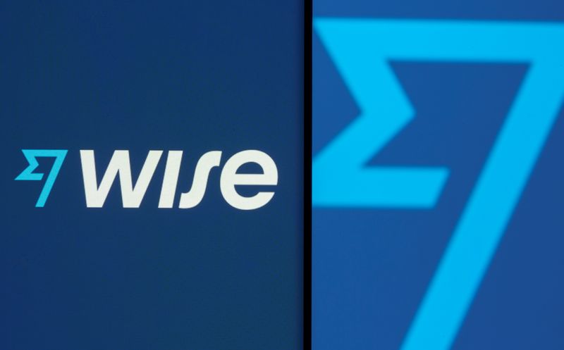 Wise logo is seen on a smartphone in front of
