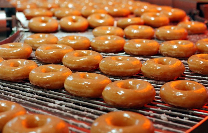 FILE PHOTO: Krispy Kreme doughnuts go into production at the