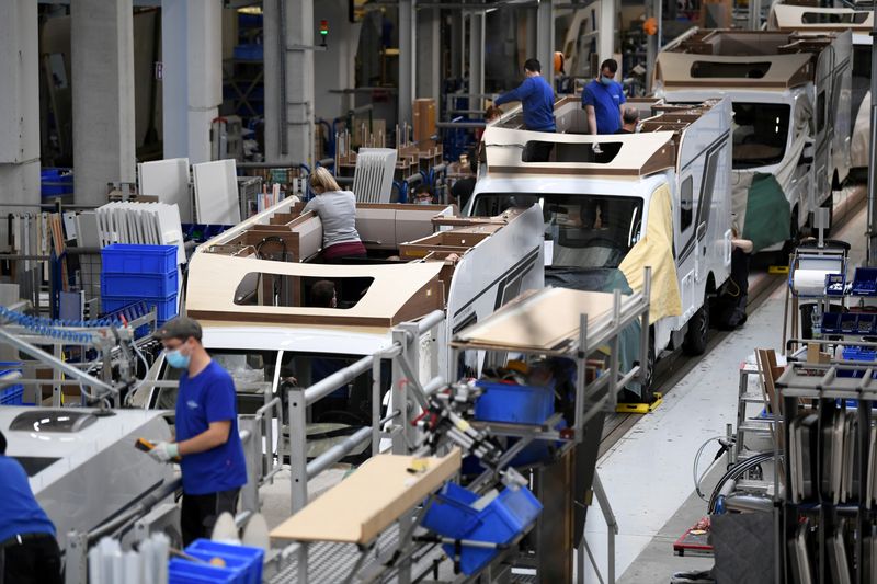FILE PHOTO: Workers assemble campers at Knaus-Tabbert AG factory in