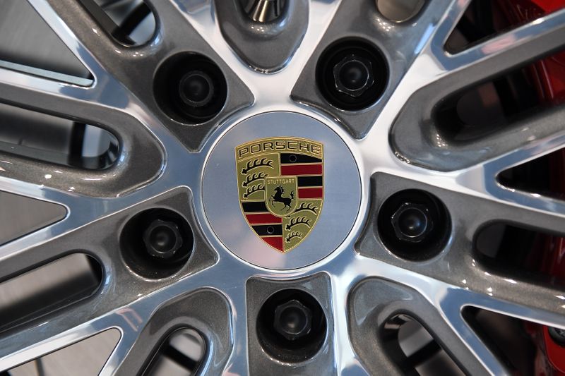The logo of German carmaker Porsche AG is seen before