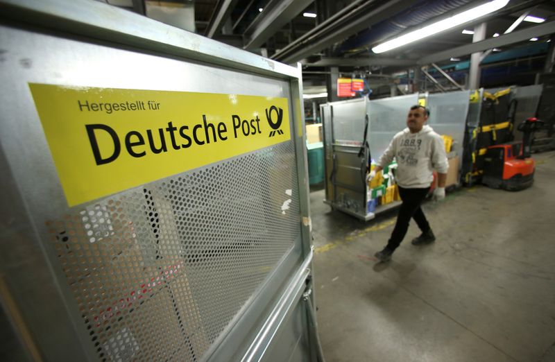An employee works at a distribution centre of Deutsche Post