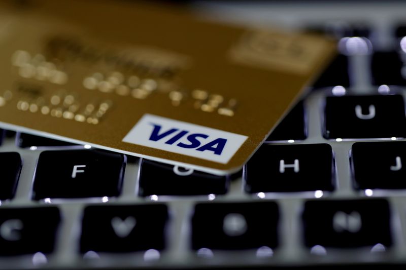 FILE PHOTO: A Visa credit card is seen on a