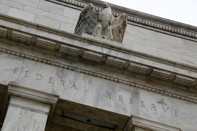 FILE PHOTO: An eagle tops the U.S. Federal Reserve building’s