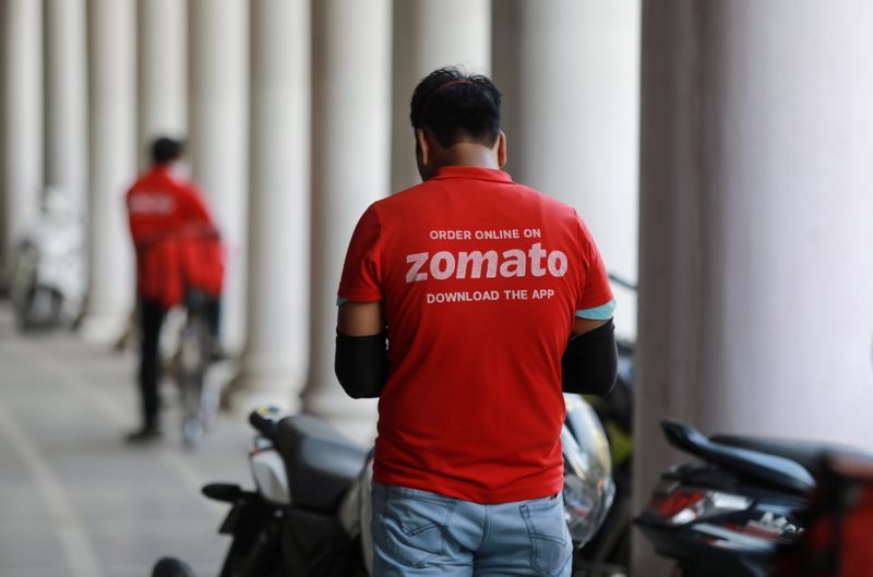FILE PHOTO: A delivery worker of Zomato, an Indian food-delivery