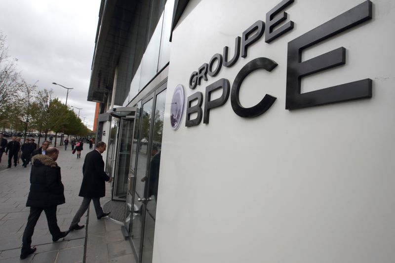 People enter BPCE bank headquarters in Paris