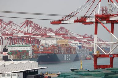 FILE PHOTO: Container ships are seen at Qingdao port