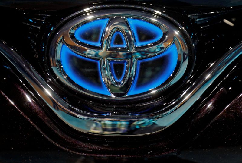 FILE PHOTO: The Toyota logo is seen on the hood