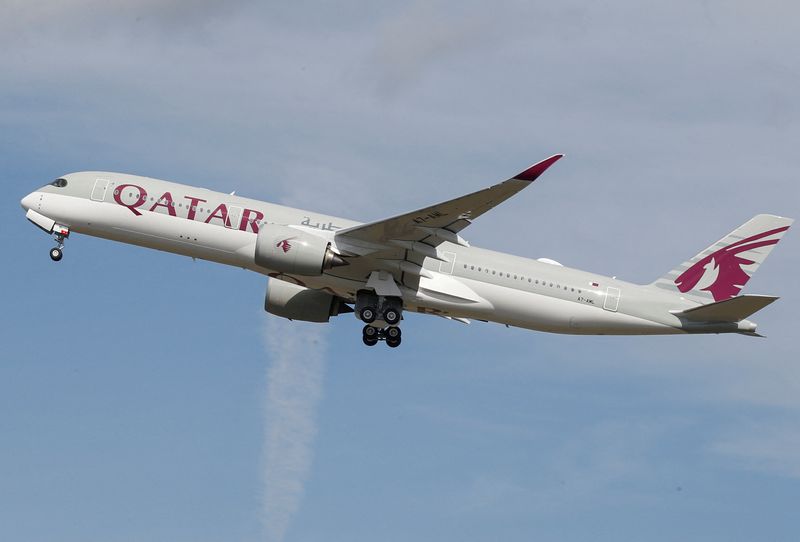 FILE PHOTO: A Qatar Airways aircraft takes off at the
