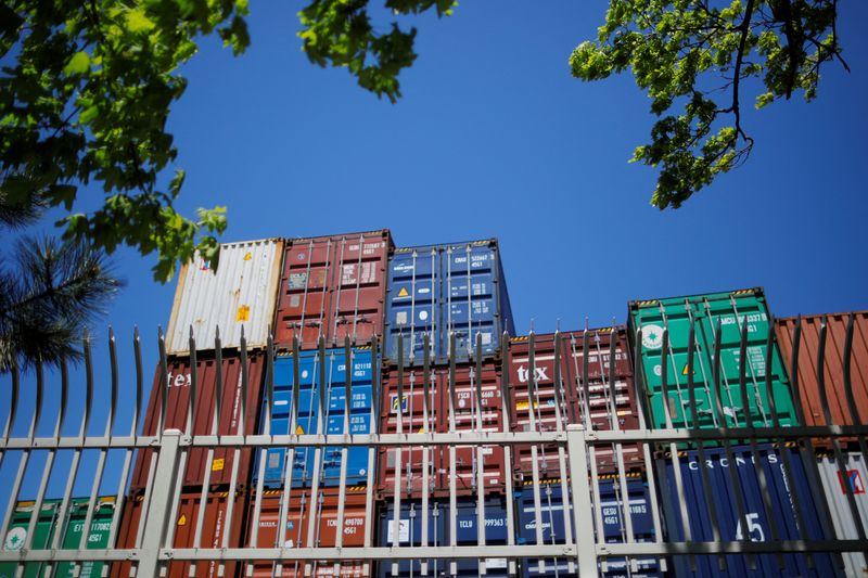 Shipping containers are stacked at the Paul W. Conley Container